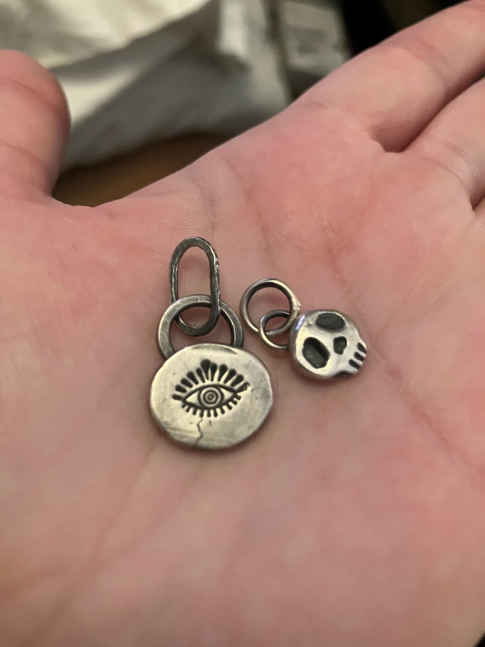 Julia Newman oxidized sterling silver charms skull evil eye